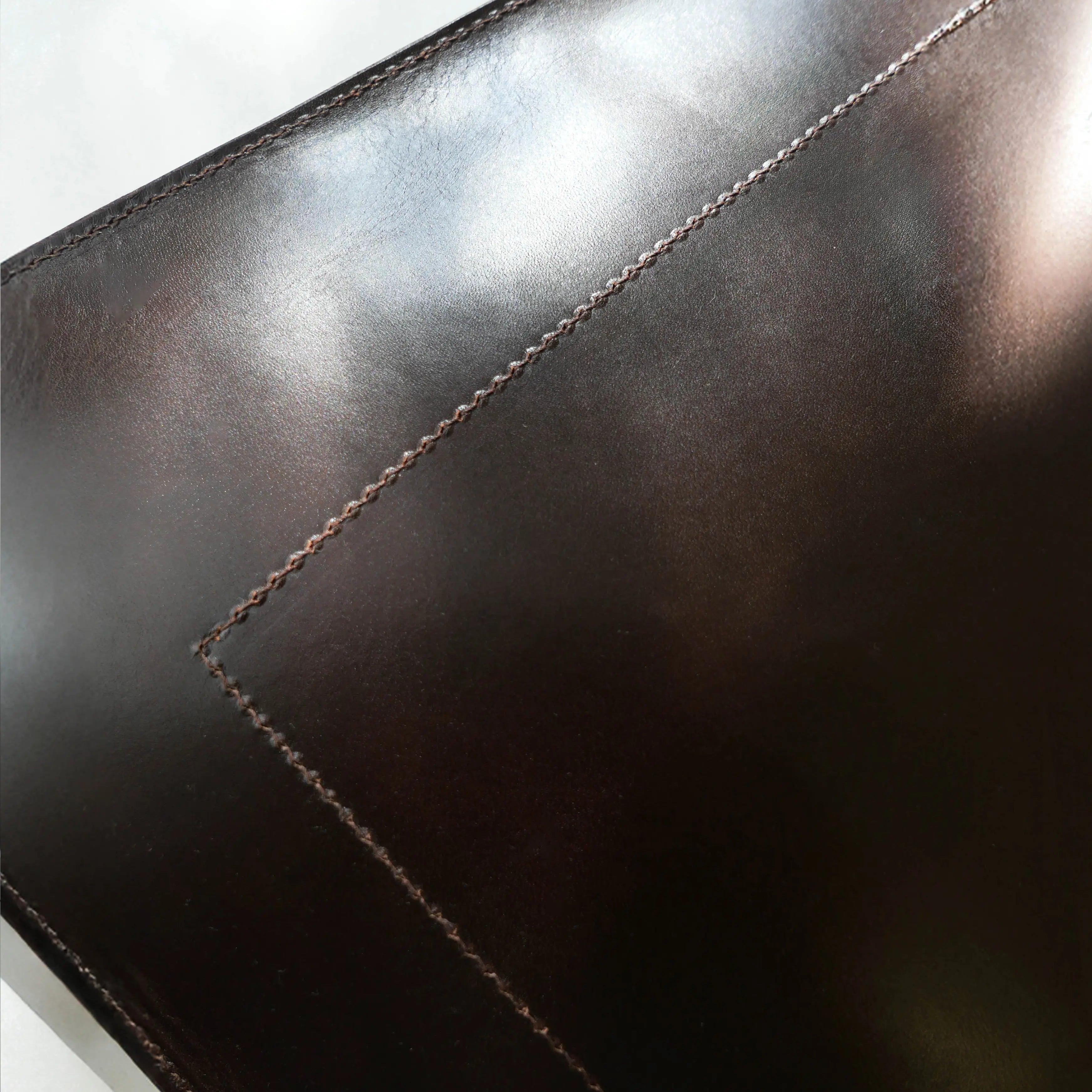 Leather laptop bag in tote form, a large premium leather tote bag suitable for work, commuting, and daily use.