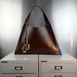 Minimalist leather tote bag handmade in Sweden, premium handbag designed for modern work and travel needs.
