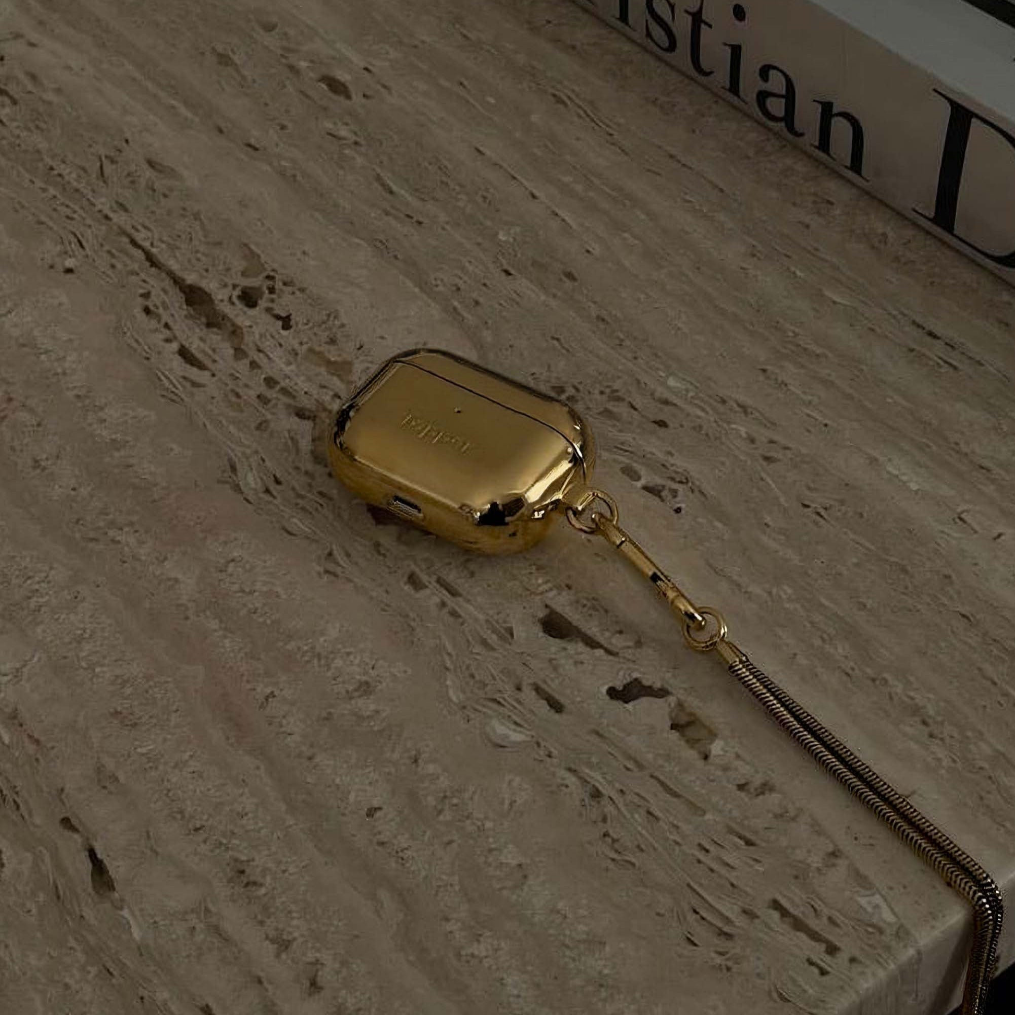 Tapper's real 18K gold plated original metal neck case jewelry protects your Apple AirPods Pro. Luxurious, elevated & accessible AirPods Pro jewellery plated in precious metals. Worried about losing your AirPods Pro? Detachable snake chain and carabiner for convenient and hassle-free safekeeping around your neck. The next must-have AirPods Pro accessory crafted for ultimate luxury. Compatible with AirPods Pro. Designed in Sweden by Tapper. Free Express Shipping at gettapper.com