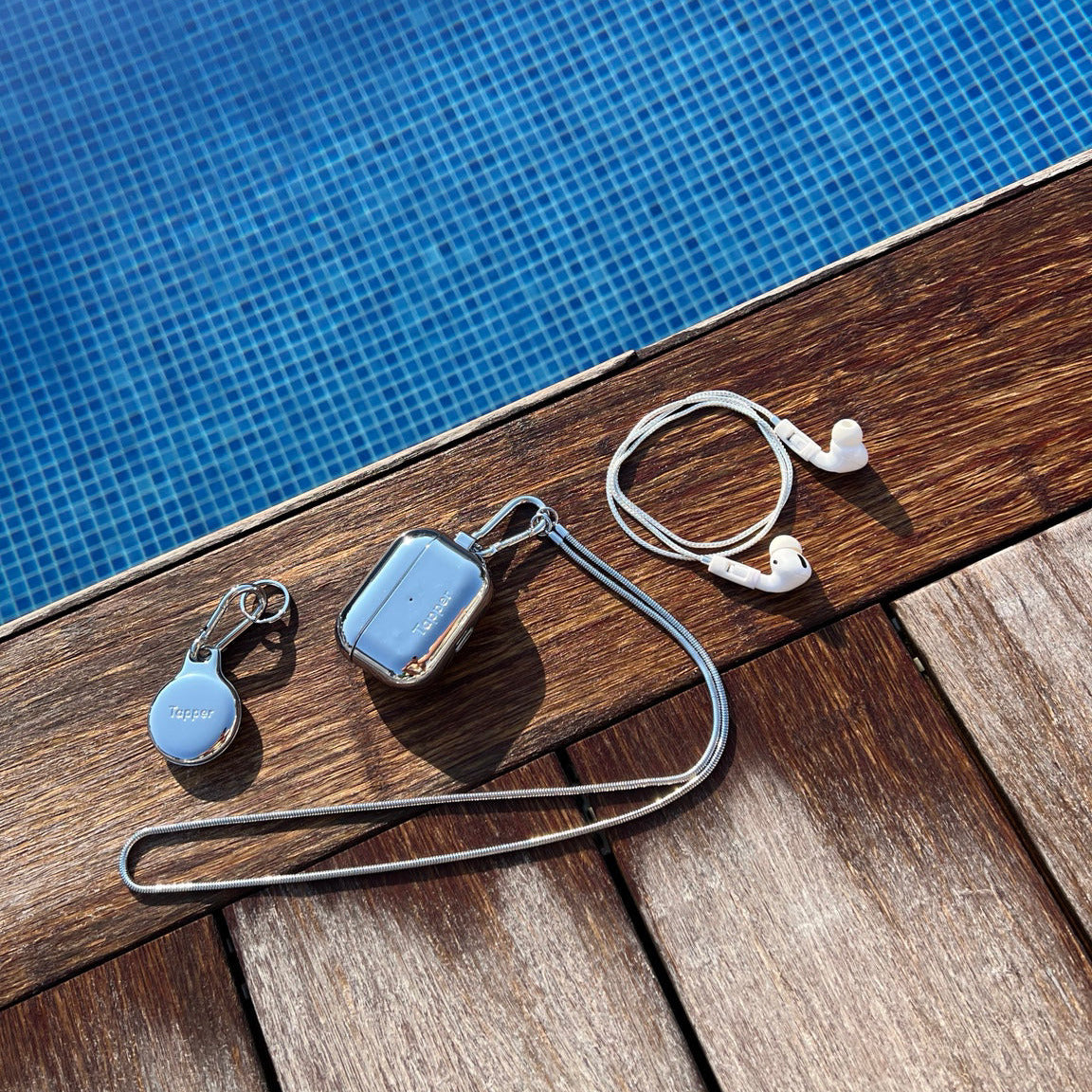 Tapper's real 925 silver plated original metal neck case tech jewelry protects and keeps your Apple AirPods Pro close at hand. The luxurious, elevated and accessible neck case plated in precious metals steps up your AirPods Pro jewellery game. Worried about losing your AirPods? Detachable snake chain and carabiner for convenient and hassle-free safekeeping around your neck. The next must-have accessory crafted for ultimate luxury. Compatible with AirPods Pro. Designed in Sweden. Free Express Shipping.