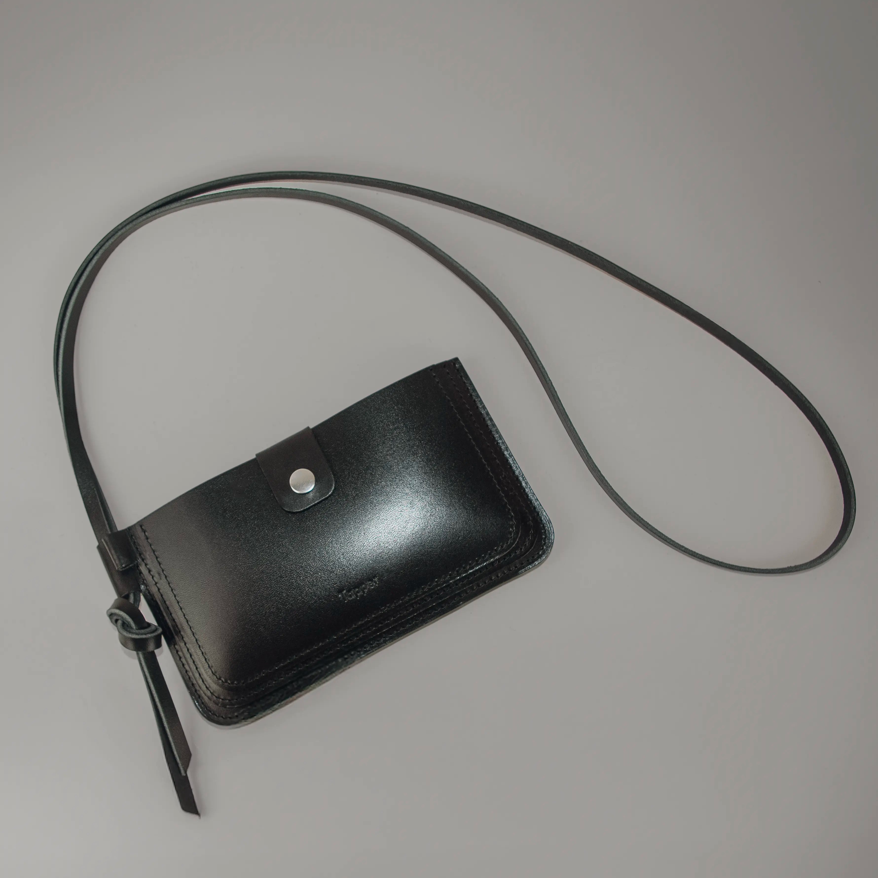 Via Leather Crossbody Bag handmade in Sweden from vegetable tanned leather, compact travel bag and passport bag for phone, wallet and essentials