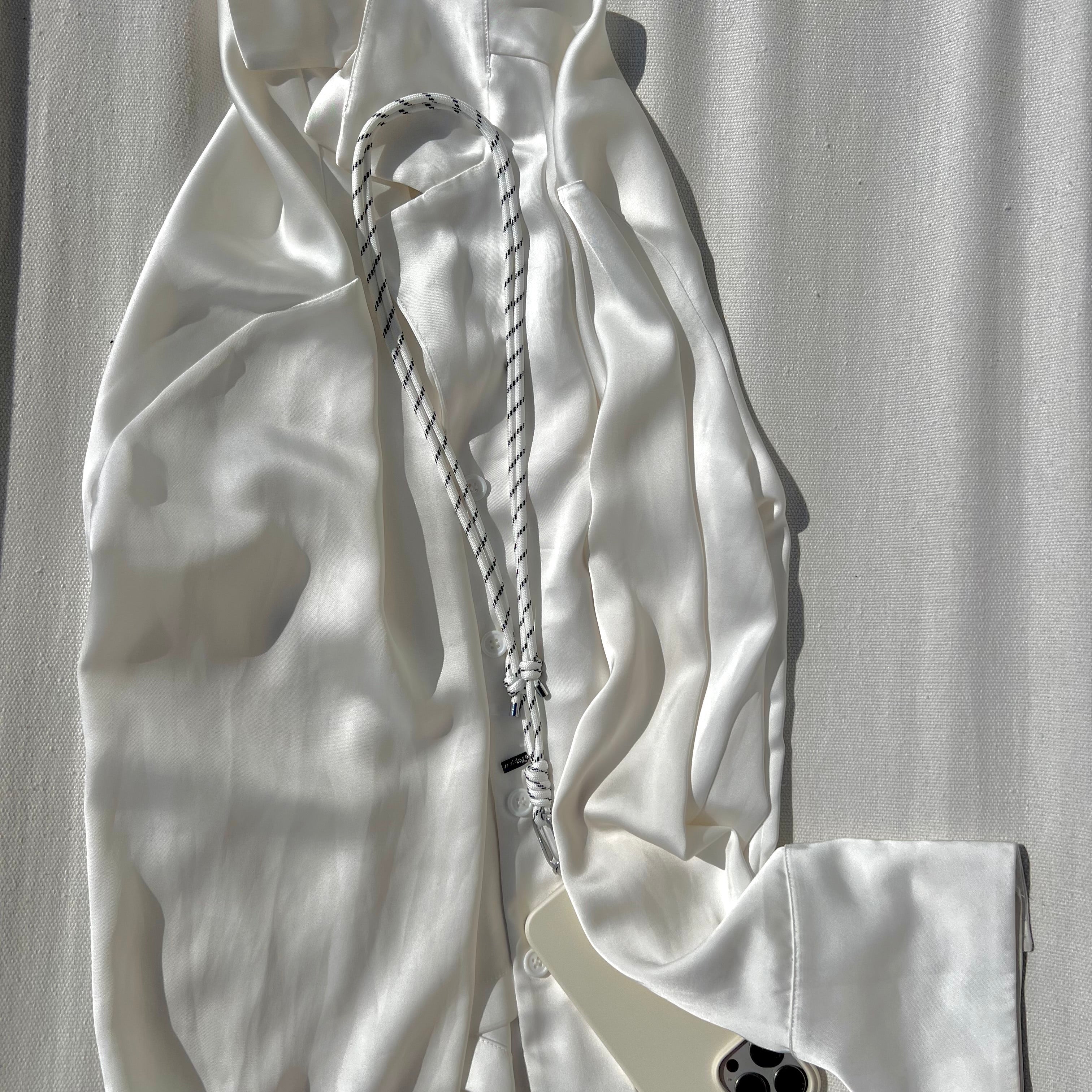 White and silver phone crossbody strap for all phones from Tapper