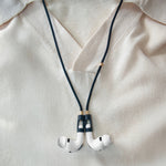 Never lose or misplace your AirPods again. Let the lightweight and durable Tapper Nylon AirPods Strap Necklace keep track of your AirPods and AirPods Pro by eliminating the need to hold them in your hands, drop them into your pockets, or risk losing them if they fall out of your ears. Comes with a built-in magnetic lock that snaps the AirPods around your neck, forming a sleek necklace and making them easily accessible. AirPods Strap compatible with Apple AirPods & AirPod Pro (1st, 2nd, 3rd, 4th generation)