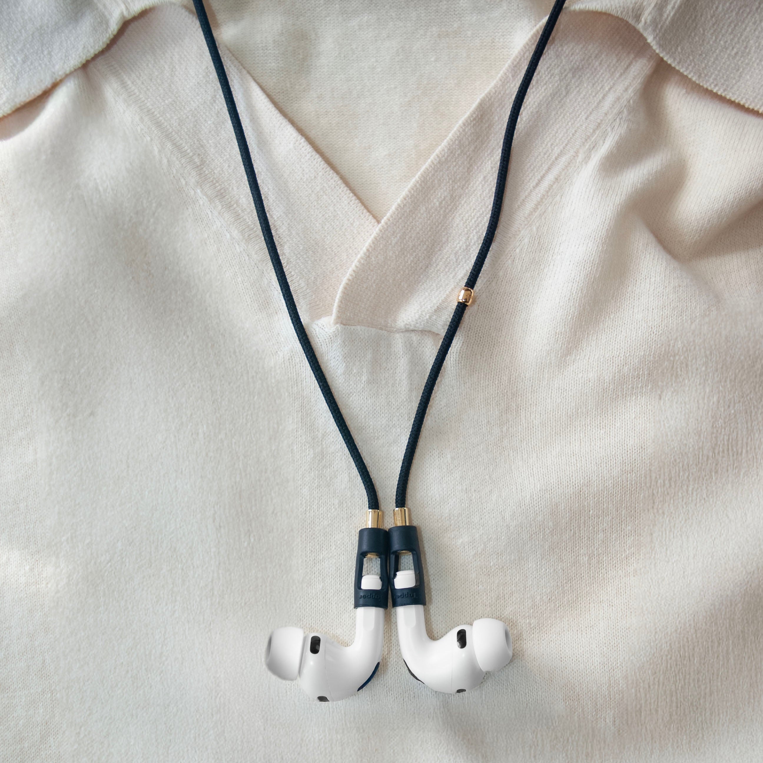 Never lose or misplace your AirPods again. Let the lightweight and durable Tapper Nylon AirPods Strap Necklace keep track of your AirPods and AirPods Pro by eliminating the need to hold them in your hands, drop them into your pockets, or risk losing them if they fall out of your ears. Comes with a built-in magnetic lock that snaps the AirPods around your neck, forming a sleek necklace and making them easily accessible. AirPods Strap compatible with Apple AirPods & AirPod Pro (1st, 2nd, 3rd, 4th generation)