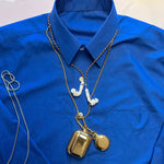 18K Gold Plated AirTag Holder & Case – Luxurious and Secure – A refined metal carabiner case designed to elegantly secure your AirTag to car keys, bags, luggage, and more. Crafted by Tapper in Sweden.