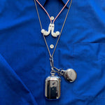 Tapper's real 925 silver plated original metal neck case tech jewelry protects and keeps your Apple AirPods Pro close at hand. The luxurious, elevated and accessible neck case plated in precious metals steps up your AirPods Pro jewellery game. Worried about losing your AirPods? Detachable snake chain and carabiner for convenient and hassle-free safekeeping around your neck. The next must-have accessory crafted for ultimate luxury. Compatible with AirPods Pro. Designed in Sweden. Free Express Shipping.