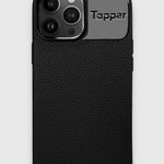 Tapper's luxurious black genuine cow leather iPhone 13 Pro Max case with MagSafe and a metal logo plate in hematite black plating that protects and elevates the look of your iPhone 13 Pro. The next must-have high end protective Apple iPhone accessory in real leather and precious metals. Designed in Sweden by Tapper. Free Express Shipping at gettapper.com