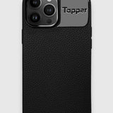 Tapper's luxurious black genuine cow leather iPhone 13 Pro Max case with MagSafe and a metal logo plate in hematite black plating that protects and elevates the look of your iPhone 13 Pro. The next must-have high end protective Apple iPhone accessory in real leather and precious metals. Designed in Sweden by Tapper. Free Express Shipping at gettapper.com