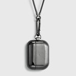 Tapper's real hematite black plated original metal neck case tech jewelry protects and keeps your Apple AirPods Pro close at hand. The luxurious, elevated and accessible neck case plated in precious metals steps up your AirPods Pro jewellery game. Worried about losing your AirPods? Detachable snake chain and carabiner for convenient and hassle-free safekeeping around your neck. The next must-have accessory crafted for ultimate luxury. Compatible with AirPods Pro. Designed in Sweden. Free Express Shipping.