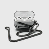 Tapper's real hematite black plated original metal neck case tech jewelry protects and keeps your Apple AirPods Pro close at hand. The luxurious, elevated and accessible neck case plated in precious metals steps up your AirPods Pro jewellery game. Worried about losing your AirPods? Detachable snake chain and carabiner for convenient and hassle-free safekeeping around your neck. The next must-have accessory crafted for ultimate luxury. Compatible with AirPods Pro. Designed in Sweden. Free Express Shipping.