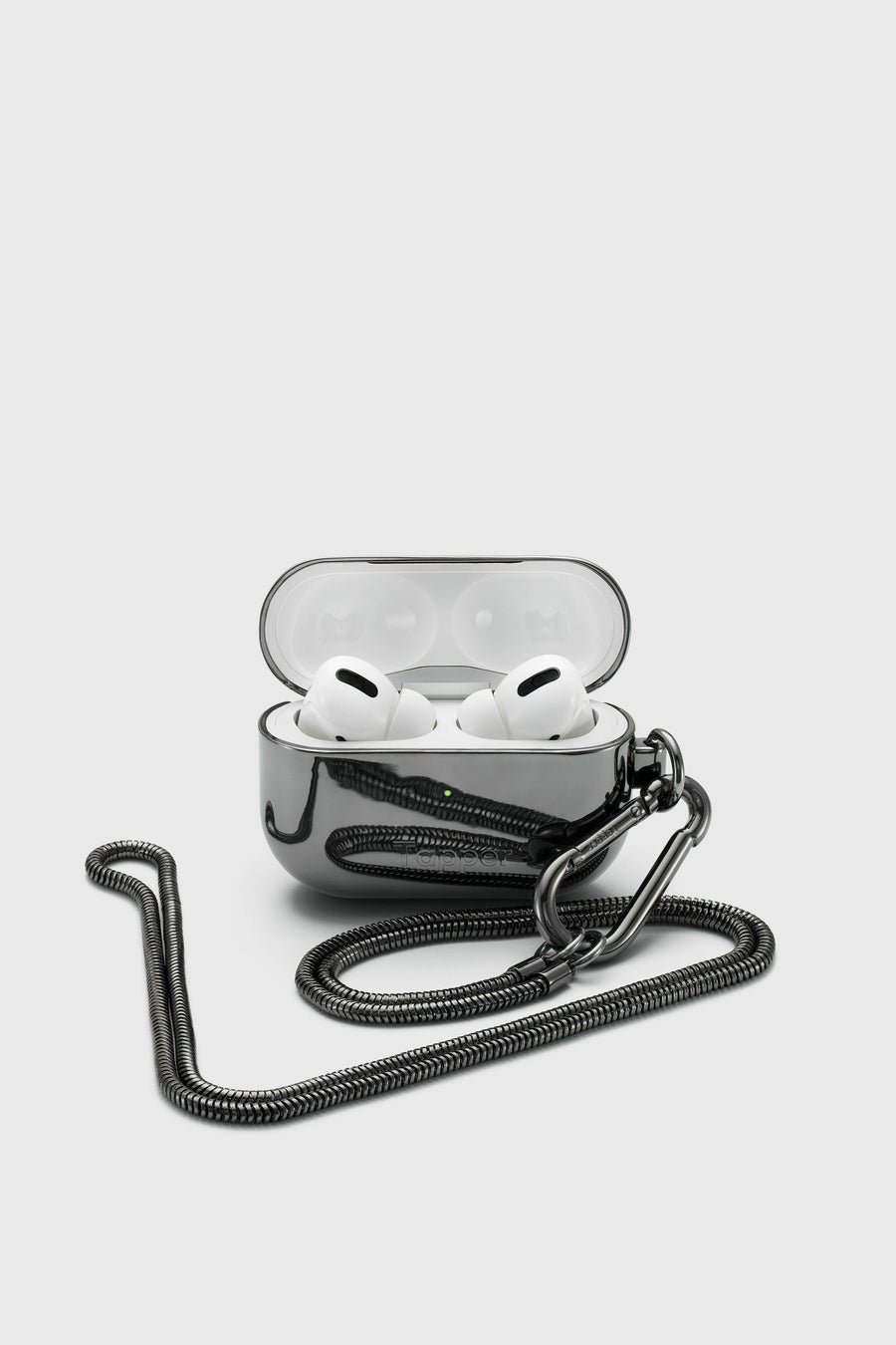 Tapper's real hematite black plated original metal neck case tech jewelry protects and keeps your Apple AirPods Pro close at hand. The luxurious, elevated and accessible neck case plated in precious metals steps up your AirPods Pro jewellery game. Worried about losing your AirPods? Detachable snake chain and carabiner for convenient and hassle-free safekeeping around your neck. The next must-have accessory crafted for ultimate luxury. Compatible with AirPods Pro. Designed in Sweden. Free Express Shipping.