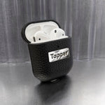 Tapper's luxurious black genuine cow leather AirPods case protects and elevates the look of your AirPods. The luxurious, protective case for AirPods with a metal logo plate colored in silver steps up your AirPods game. The next must-have high end protective Apple AirPods accessory in real leather and metal details. Compatible with AirPods (1st and 2nd generation). Designed in Sweden by Tapper. Free Express Shipping at gettapper.com