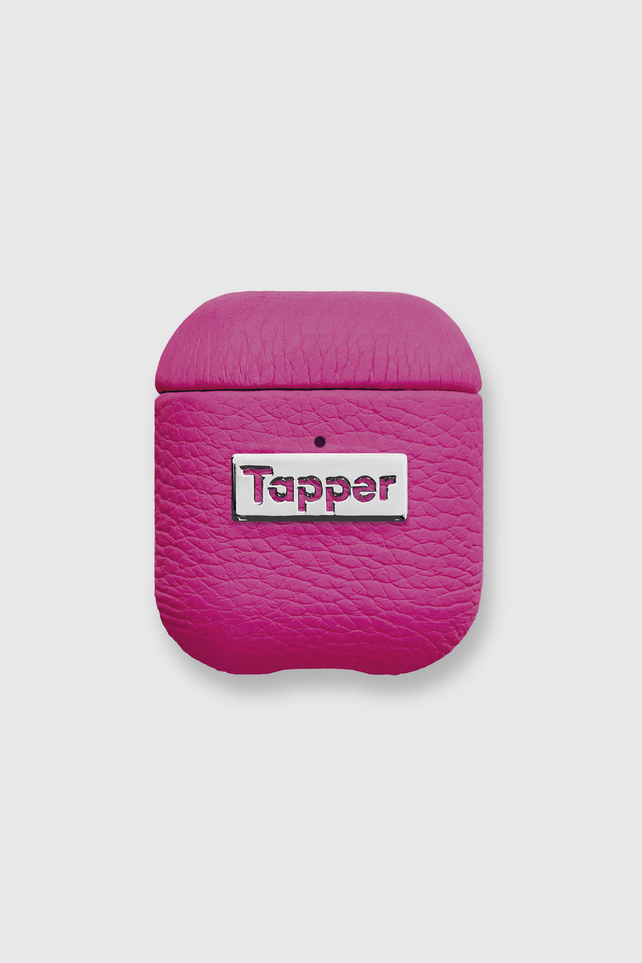 Tapper's luxurious hot pink genuine lamb leather AirPods case protects and elevates the look of your AirPods. The luxurious, protective case for AirPods with a metal logo plate colored in silver steps up your AirPods game. The next must-have high end protective Apple AirPods accessory in bright pink real leather and metal details. Compatible with AirPods (1st and 2nd generation). Designed in Sweden by Tapper. Free Express Shipping at gettapper.com
