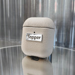Tapper's luxurious sand beige genuine cow leather AirPods case protects and elevates the look of your AirPods. The luxurious, protective case for AirPods with a metal logo plate colored in silver steps up your AirPods game. The next must-have high end protective Apple AirPods accessory in real leather and metal details. Compatible with AirPods (1st and 2nd generation). Designed in Sweden by Tapper. Free Express Shipping at gettapper.com