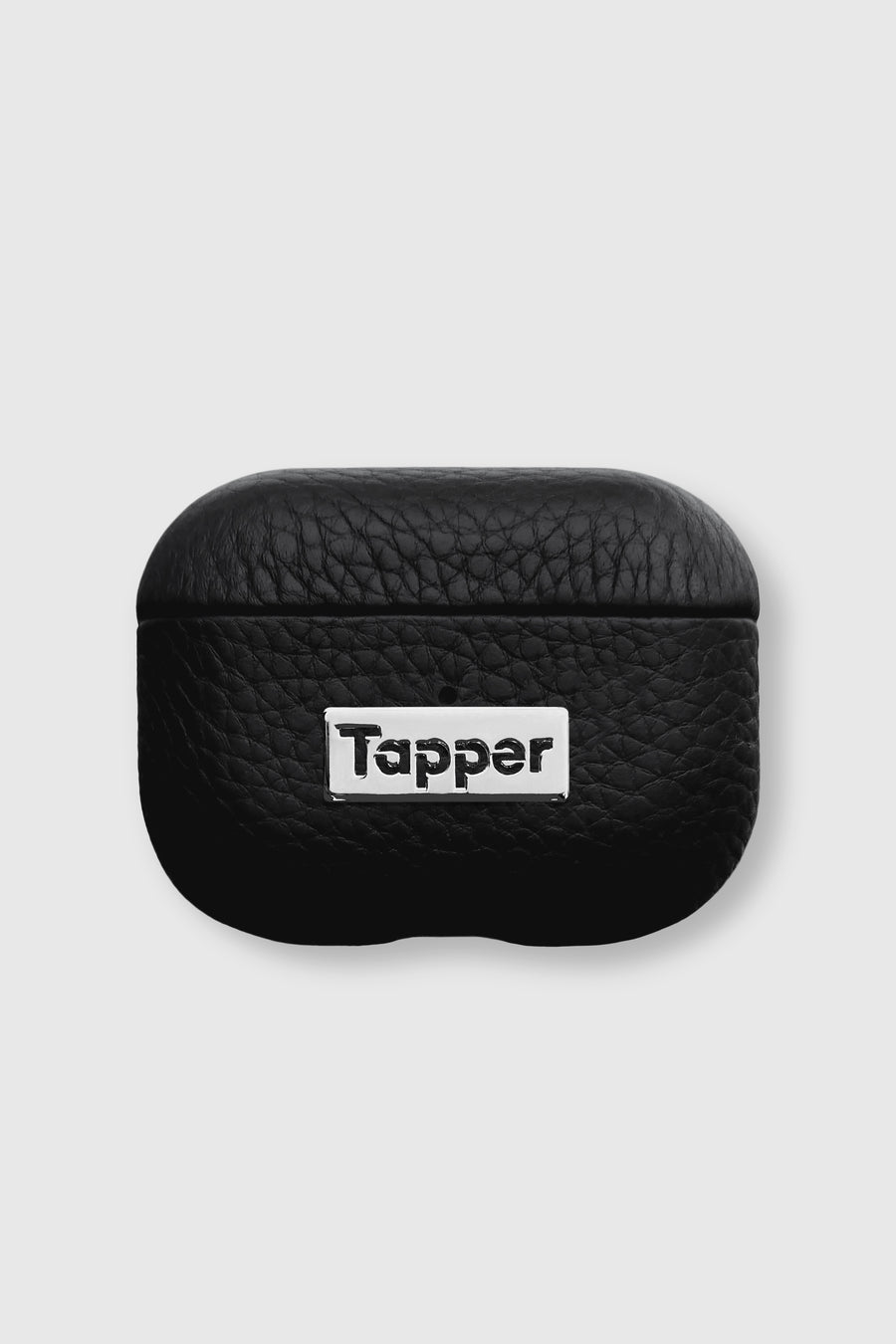 Tapper's luxurious black genuine lamb leather AirPods case protects and elevates the look of your AirPods Pro. The luxurious, protective case for AirPods Pro with a metal logo plate colored in silver steps up your AirPods game. The next must-have high end protective Apple AirPods accessory in real leather and metal details. Compatible with AirPods Pro. Designed in Sweden by Tapper. Free Express Shipping at gettapper.com