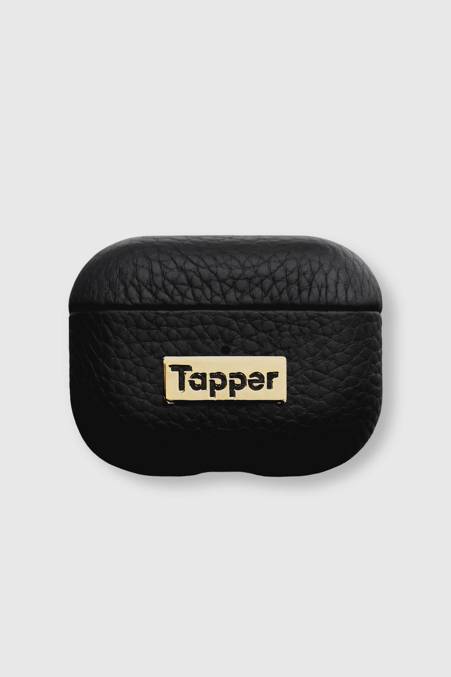 Tapper's luxurious black genuine lamb leather AirPods case protects and elevates the look of your AirPods Pro. The luxurious, protective case for AirPods Pro with a metal logo plate in real 18k gold plating steps up your AirPods game. The next must-have high end protective Apple AirPods accessory in real leather and precious metals. Compatible with AirPods Pro. Designed in Sweden by Tapper. Free Express Shipping at gettapper.com