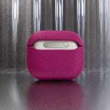 Tapper's luxurious hot pink genuine cow leather AirPods case protects and elevates the look of your AirPods. The luxurious, protective case for AirPods with a metal logo plate colored in silver steps up your AirPods game. The next must-have high end protective Apple AirPods accessory in bright pink real leather with metal details. Compatible with AirPods (3rd generation). Designed in Sweden by Tapper. Free Express Shipping at gettapper.com