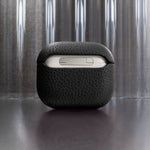 Tapper's luxurious black genuine cow leather AirPods case protects and elevates the look of your AirPods. The luxurious, protective case for AirPods with a metal logo plate in real 18k gold plating steps up your AirPods game. The next must-have high end protective Apple AirPods accessory in real leather and precious metals. Compatible with AirPods (3rd generation). Designed in Sweden by Tapper. Free Express Shipping at gettapper.com