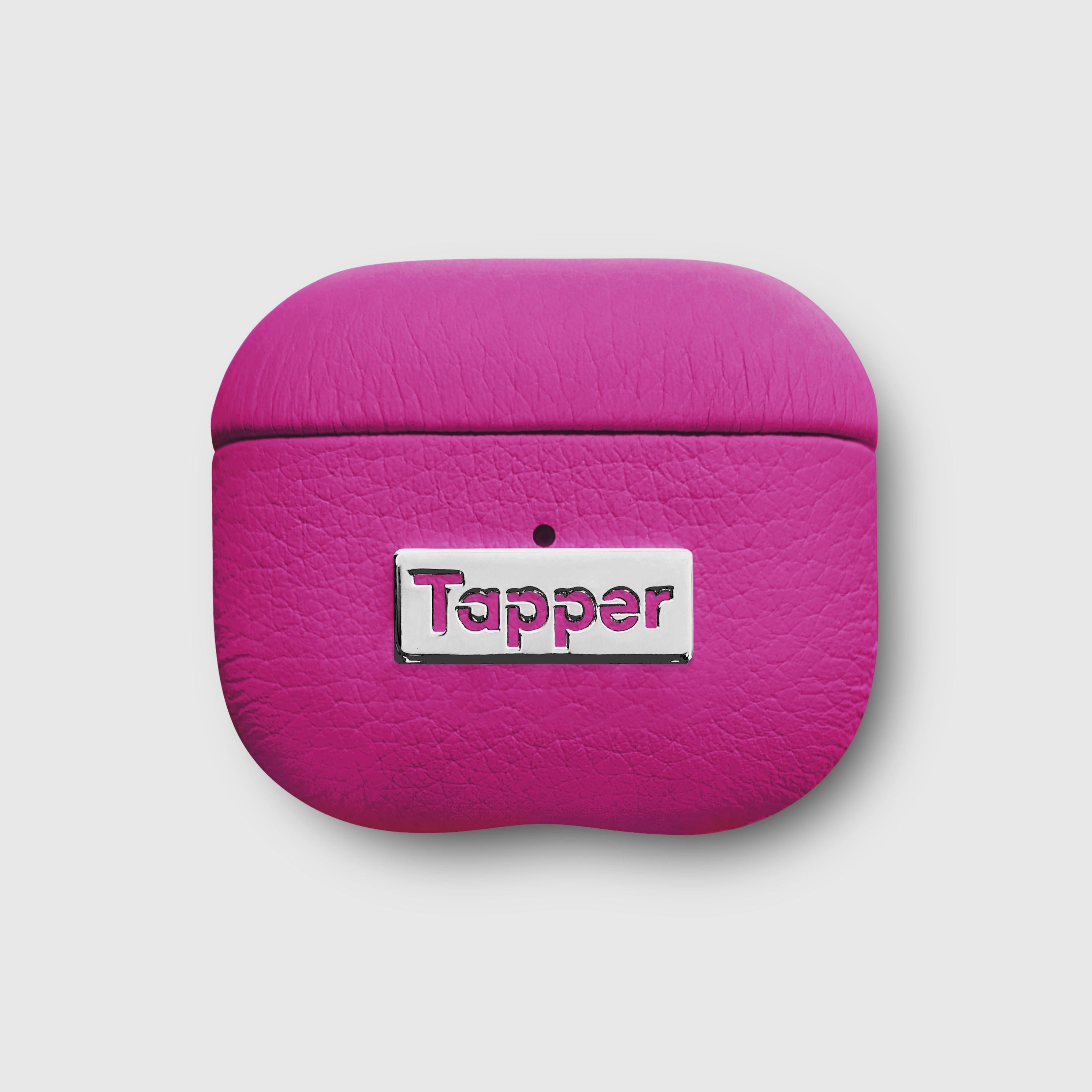 Tapper's luxurious hot pink genuine lamb leather AirPods case protects and elevates the look of your AirPods. The luxurious, protective case for AirPods with a metal logo plate colored in silver steps up your AirPods game. The next must-have high end protective Apple AirPods accessory in bright pink real leather with metal details. Compatible with AirPods (3rd generation). Designed in Sweden by Tapper. Free Express Shipping at gettapper.com