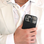 Tapper's luxurious black genuine lamb leather iPhone 13 Pro Max case with MagSafe and a metal logo plate in hematite black plating that protects and elevates the look of your iPhone 13 Pro. The next must-have high end protective Apple iPhone accessory in real leather and precious metals. Designed in Sweden by Tapper. Free Express Shipping at gettapper.com